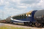 Rocky Mountaineer coach #2003 sandwiched among MPRSS' freight cars